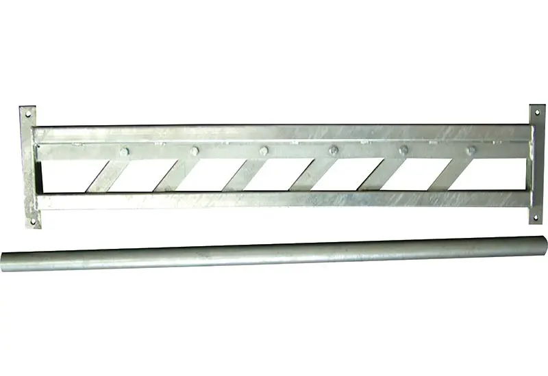 A close-up of a rump bar and anti-backing mechanism in a cattle race